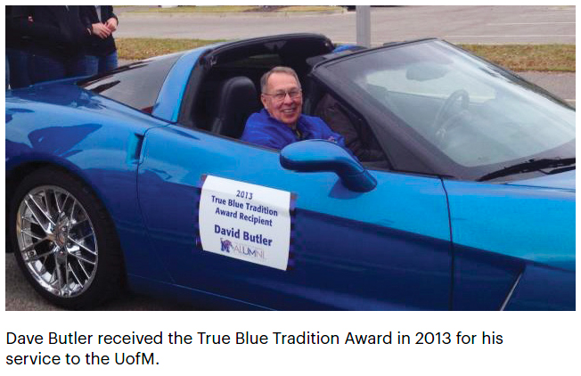 Dave Butler in car in parade | Dave Butler received the True Blue Tradition Award in 2013 for his service to the UofM.