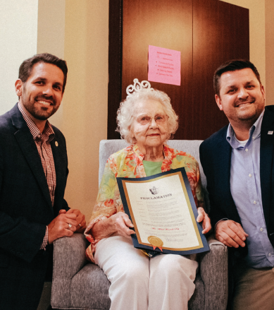 mabel womack receiving certificate award