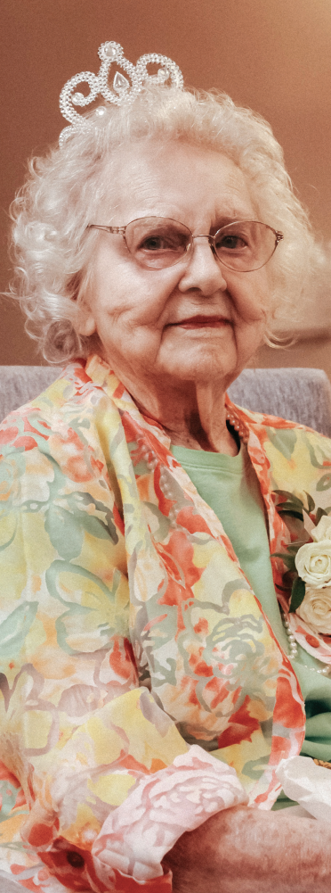 Mabel Womack Telling her story and wearing a tiara