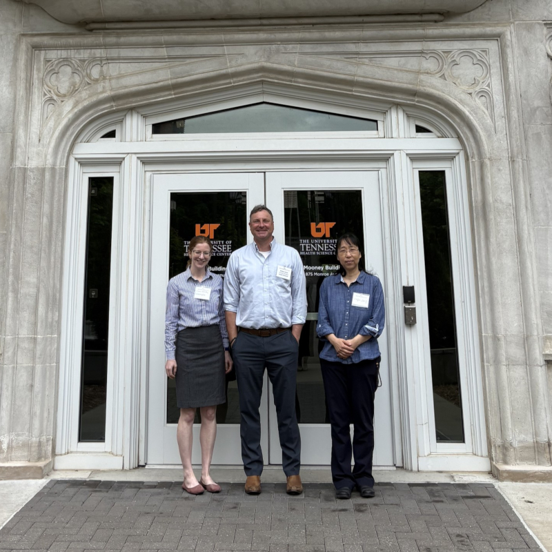 Upskill staff in front of building