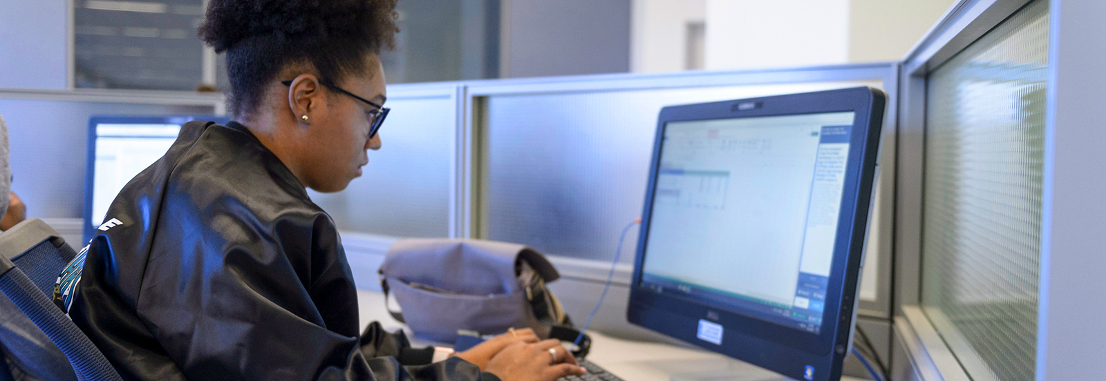 student working on computer